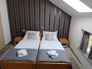 Posteľ alebo postele v izbe v ubytovaní Guest House Toic