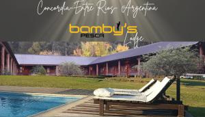 a advertisement for a resort with a pool and lounge chairs at HOTEL Bambys Lodge in Concordia