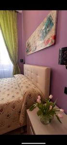 A bed or beds in a room at Guest House Biondi