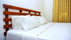 Letto o letti in una camera di Sigiriya Dreamscape Villa