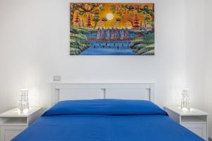 Postel nebo postele na pokoji v ubytování Le camere di Riva delle donne by Vivimy