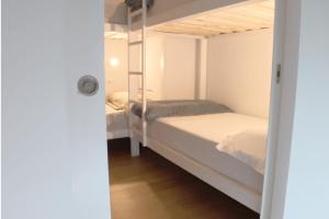 Postel nebo postele na pokoji v ubytování Aiora Hostel