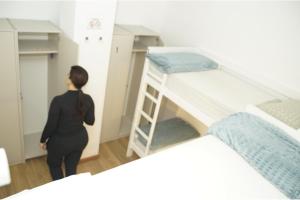 Postel nebo postele na pokoji v ubytování Aiora Hostel