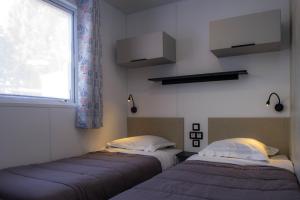 Postel nebo postele na pokoji v ubytování Resort Top TV 6 Pers