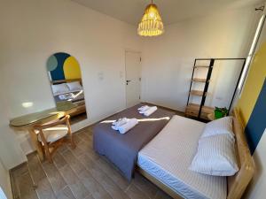 Letto o letti in una camera di Nomads Hostel