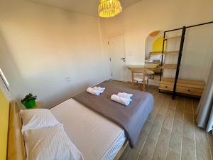 Letto o letti in una camera di Nomads Hostel