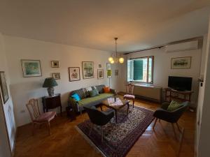 a living room with a couch and a table at Vila Zorka in Trebinje