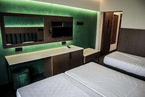 Postel nebo postele na pokoji v ubytování Atliman Beach Park Hotel