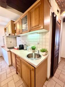 Kuchyňa alebo kuchynka v ubytovaní Apartmány Nerudova 36
