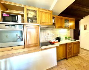 Kuchyňa alebo kuchynka v ubytovaní Apartmány Nerudova 36