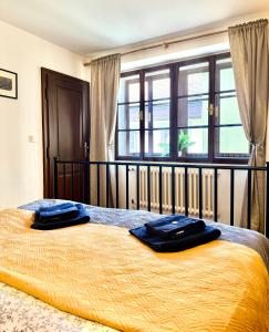 Posteľ alebo postele v izbe v ubytovaní Apartmány Nerudova 36