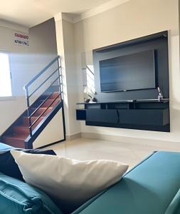 TV a/nebo společenská místnost v ubytování Residencial Castelo Branco
