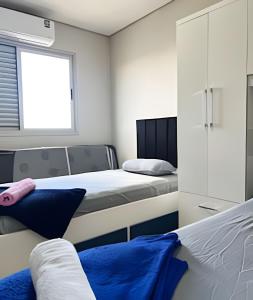 Postel nebo postele na pokoji v ubytování Residencial Castelo Branco