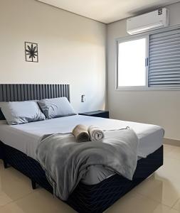 Postel nebo postele na pokoji v ubytování Residencial Castelo Branco