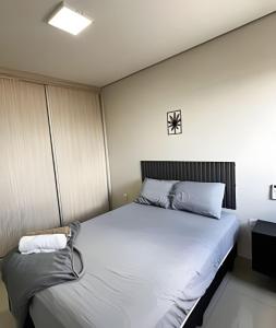Postel nebo postele na pokoji v ubytování Residencial Castelo Branco
