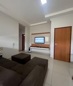 TV a/nebo společenská místnost v ubytování Residencial Castelo Branco
