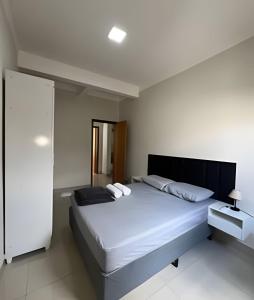 Postel nebo postele na pokoji v ubytování Residencial Castelo Branco