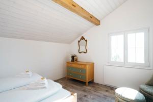 Postel nebo postele na pokoji v ubytování Apartment Sunnerösli