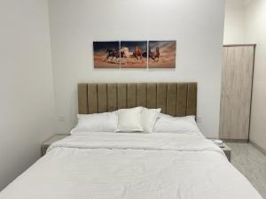 Postel nebo postele na pokoji v ubytování AL Rabie Resort ,Nizwa Grand Mall