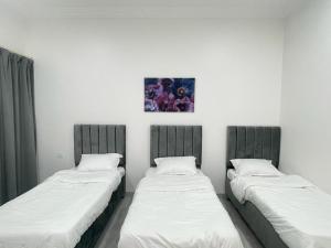 Postel nebo postele na pokoji v ubytování AL Rabie Resort ,Nizwa Grand Mall