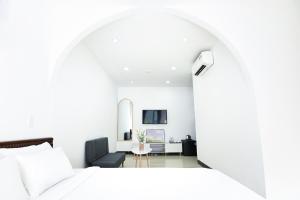 TV a/nebo společenská místnost v ubytování Horizon Côn Đảo Hotel