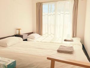 Home Story in Tokyo Kanamachi&東京屋語客房内的一张或多张床位