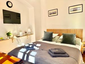 Posteľ alebo postele v izbe v ubytovaní Apartmány Nerudova 36