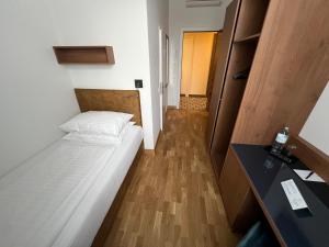 Letto o letti in una camera di Hotel Secession an der Oper