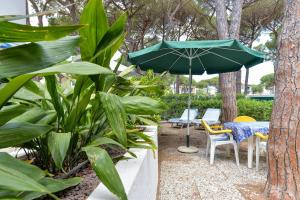 A garden outside Villa Fantagali apt 502