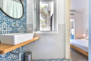 A bed or beds in a room at Villa Fantagali apt 502