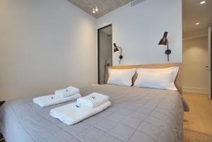 Ένα ή περισσότερα κρεβάτια σε δωμάτιο στο Marelys Villa Nea Skioni by Halkidiki Villas