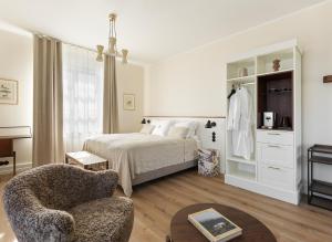 Posteľ alebo postele v izbe v ubytovaní Hotel Búdir