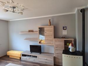 Μια τηλεόραση ή/και κέντρο ψυχαγωγίας στο Cosy flat close to the center