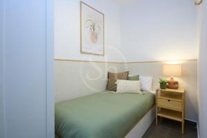 En eller flere senge i et værelse på Céntrico apartamento