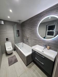 Ένα μπάνιο στο Luxury Private Room in High Barnet