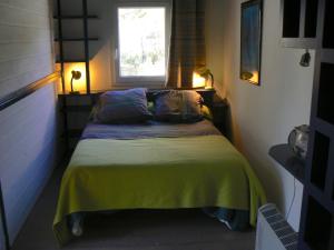 Postel nebo postele na pokoji v ubytování chambres d'hôtes le Sabel