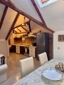 Kuchyň nebo kuchyňský kout v ubytování Tetka Apartments