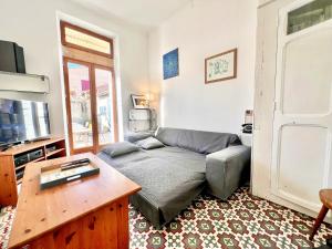 TV a/nebo společenská místnost v ubytování Villa Mahana - Jardin, Centre-Ville, 8 personnes, 3 chambres, Parking, Clim