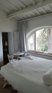 Posteľ alebo postele v izbe v ubytovaní B&B A Piazza del Gesù