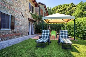 Vonkajšia záhrada v ubytovaní Cozy House in Castelnuovo di Garfagnana + Large Garden
