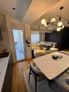 Χώρος καθιστικού στο Fox Lux Apartment