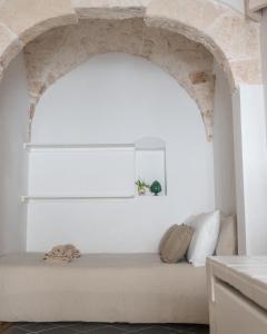 Postel nebo postele na pokoji v ubytování MAJA Ostuni Centro - Holiday Apartment