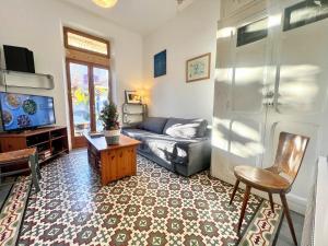 TV a/nebo společenská místnost v ubytování Villa Mahana - Jardin, Centre-Ville, 8 personnes, 3 chambres, Parking, Clim