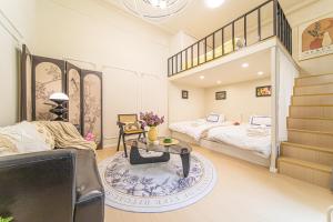 Voodi või voodid majutusasutuse 上海小胖纸民宿-南京西路3店-桃之夭夭 toas