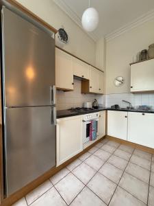 Kuchyň nebo kuchyňský kout v ubytování St Andrews Golf Apartment