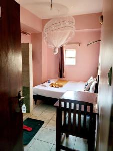 Postel nebo postele na pokoji v ubytování Sislink Hotel Nairobi
