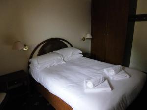 Postel nebo postele na pokoji v ubytování Hotel Residence Valverde