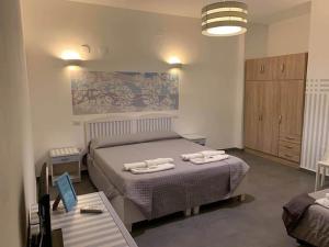 A bed or beds in a room at Vintage