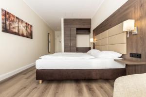 Postel nebo postele na pokoji v ubytování Hotel Ohlenhoff