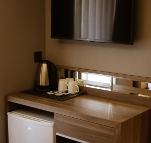 Kuchyň nebo kuchyňský kout v ubytování Viola Hotel Budva